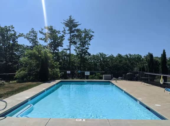 Modern Weirs Beach Getaway | Pool | Winnipesaukee